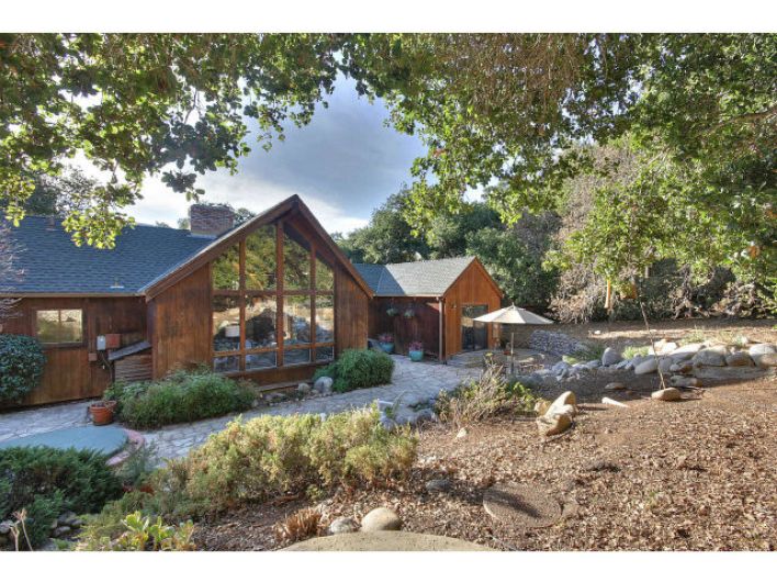 This Carmel rambler had a non-permitted barn conversion that prevented its sale. Our remodel design solved the problem