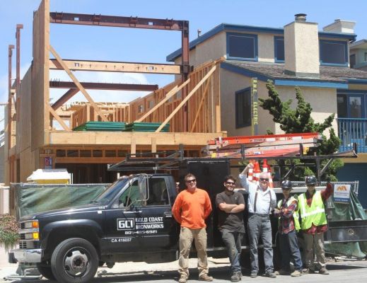 Robert Meckauer and ironworker crew after completion of successful install of 3-story high moment frame