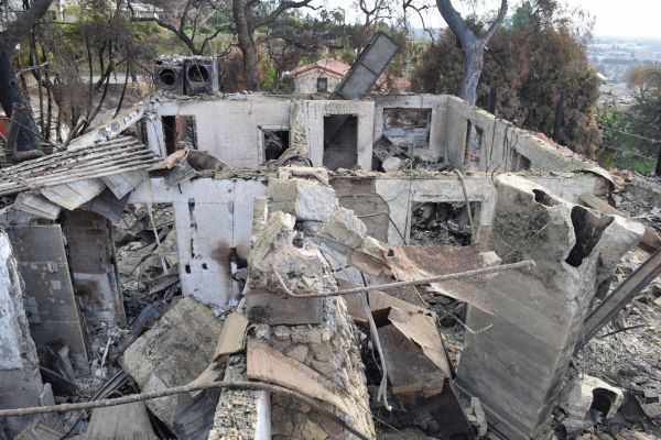 Wildfire debris of 3-story hillside home destroyed during the Thomas Fire in Ventura, CA