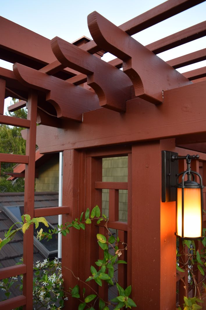 Detail of finished custom deck trellis designed by Robert to match the Craftsman styling of the existing home